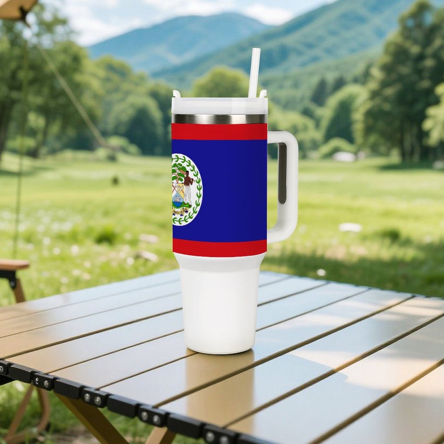 [Brand] tumbler with Belize flag on outdoor table setting.