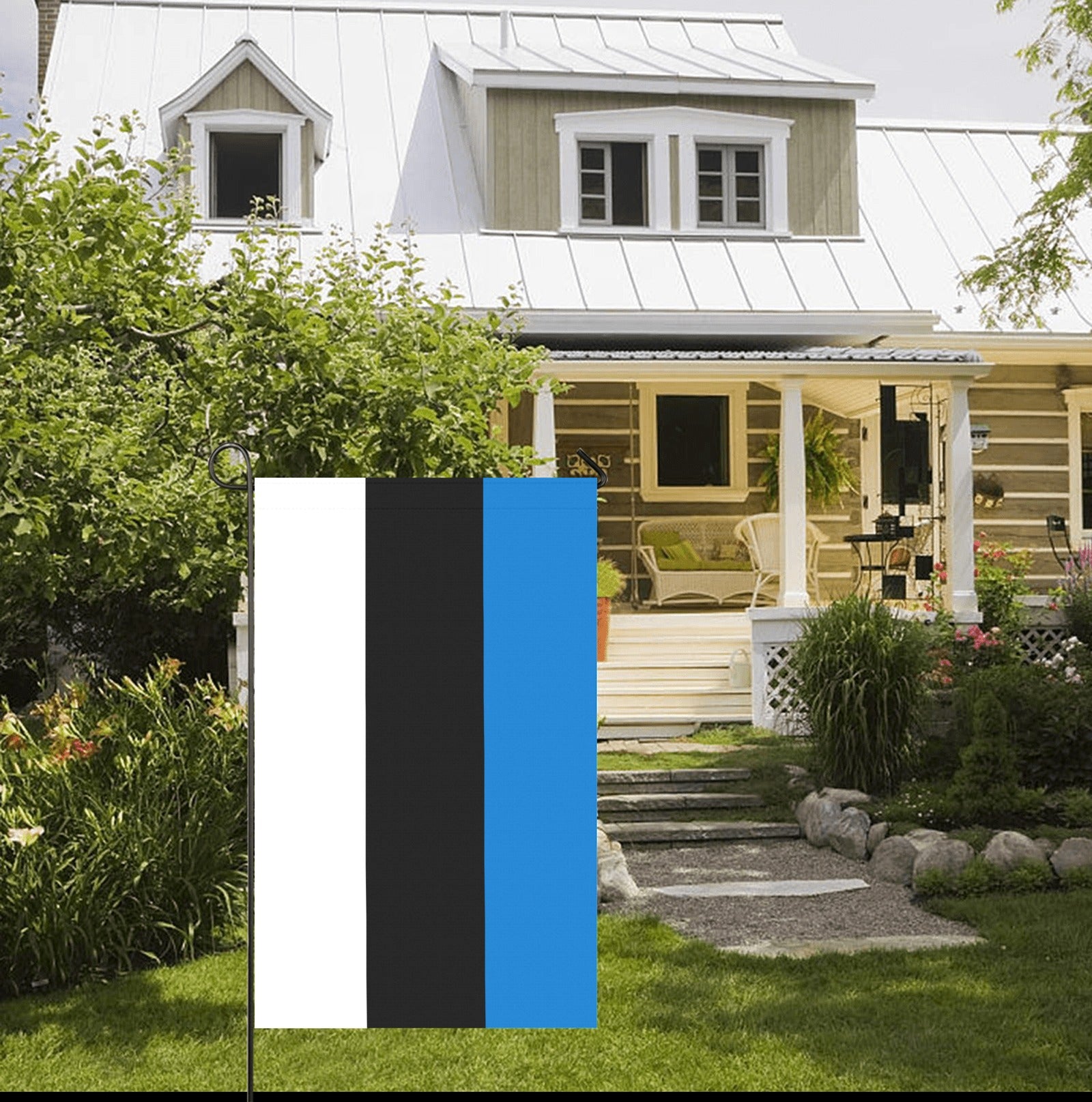 Housefront with garden and Luv My Flag displayed outside.
