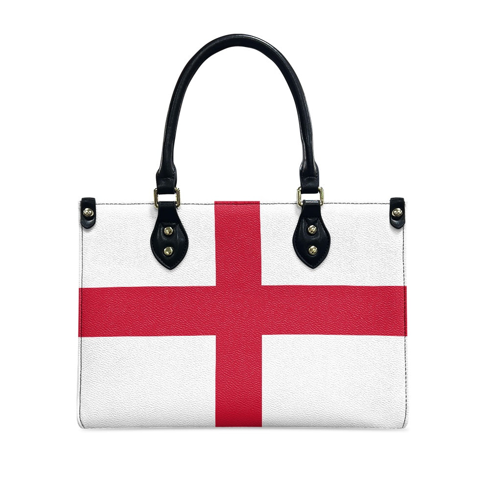 [Brand] handbag with England flag design, featuring black handles.