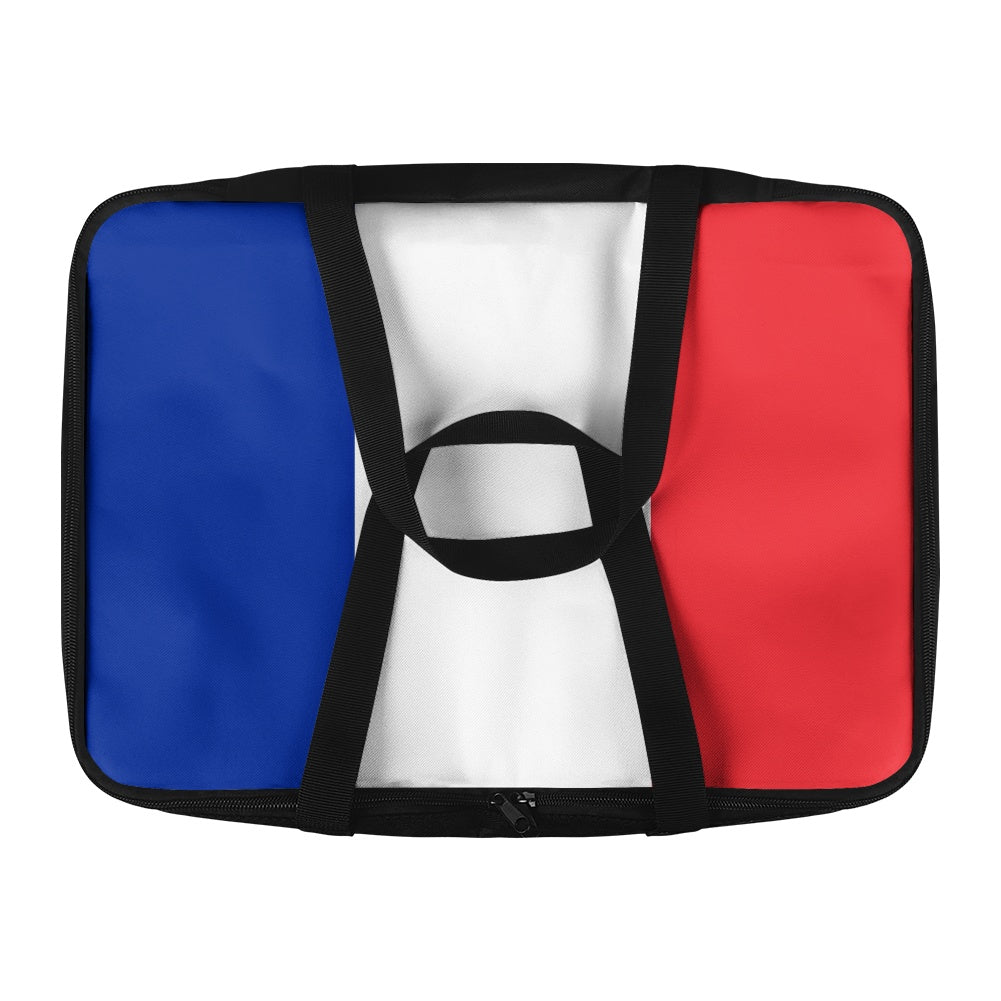 [Brand] bag with French flag design, black straps.