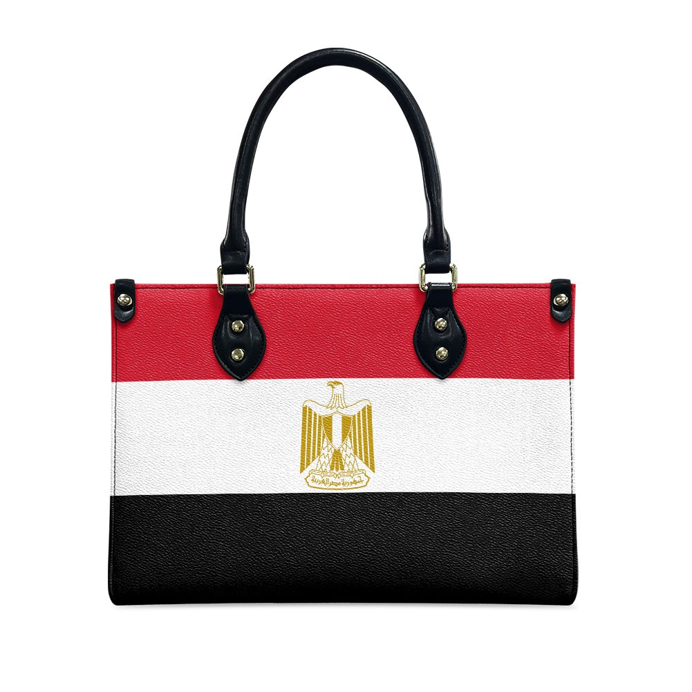 [Brand] handbag featuring the Egyptian flag design with emblem.