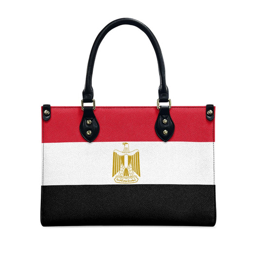 [Brand] handbag featuring the Egyptian flag design with emblem.