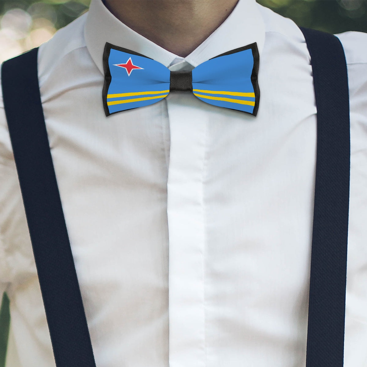 Man wearing [Brand] bow tie with Aruba flag design.
