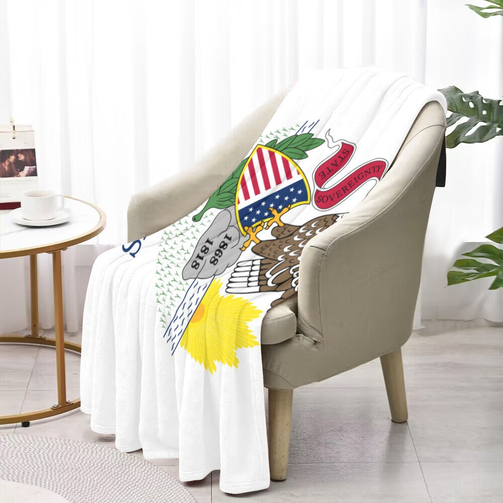 [Luv My Flag] throw blanket draped over beige chair.