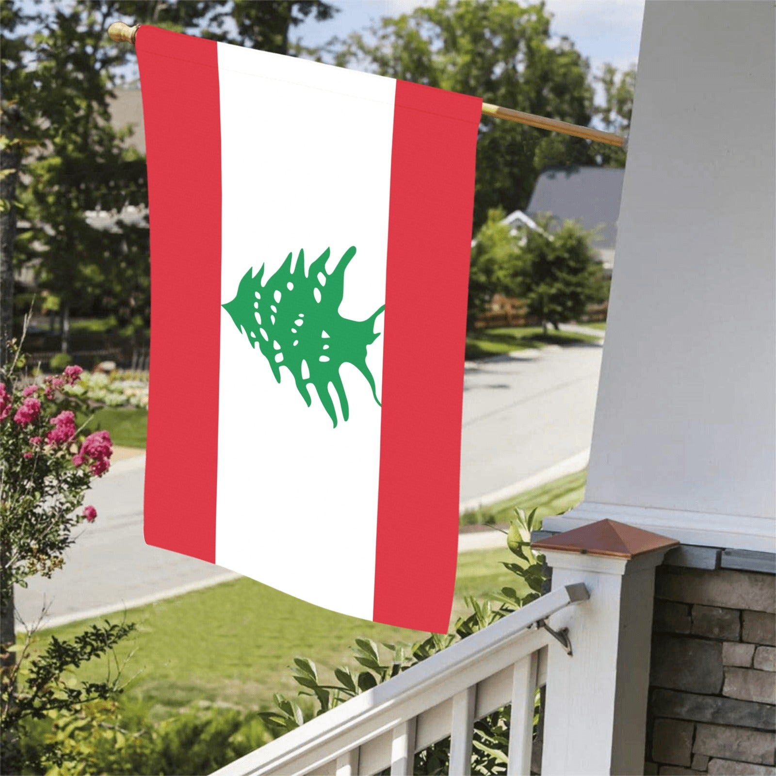 Luv My Flag displays Lebanese flag on suburban porch.