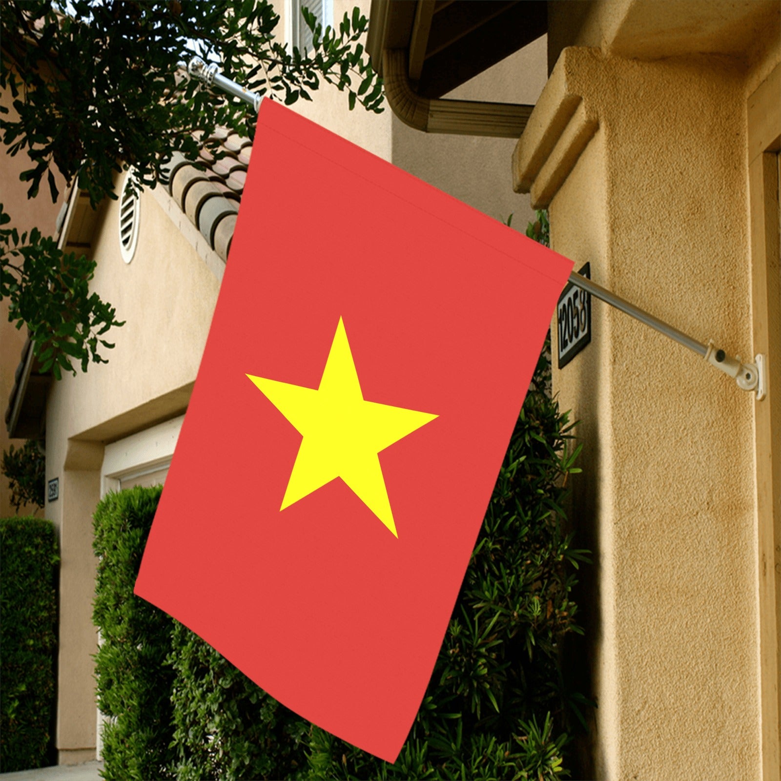 Red flag with yellow star on house, Luv My Flag.