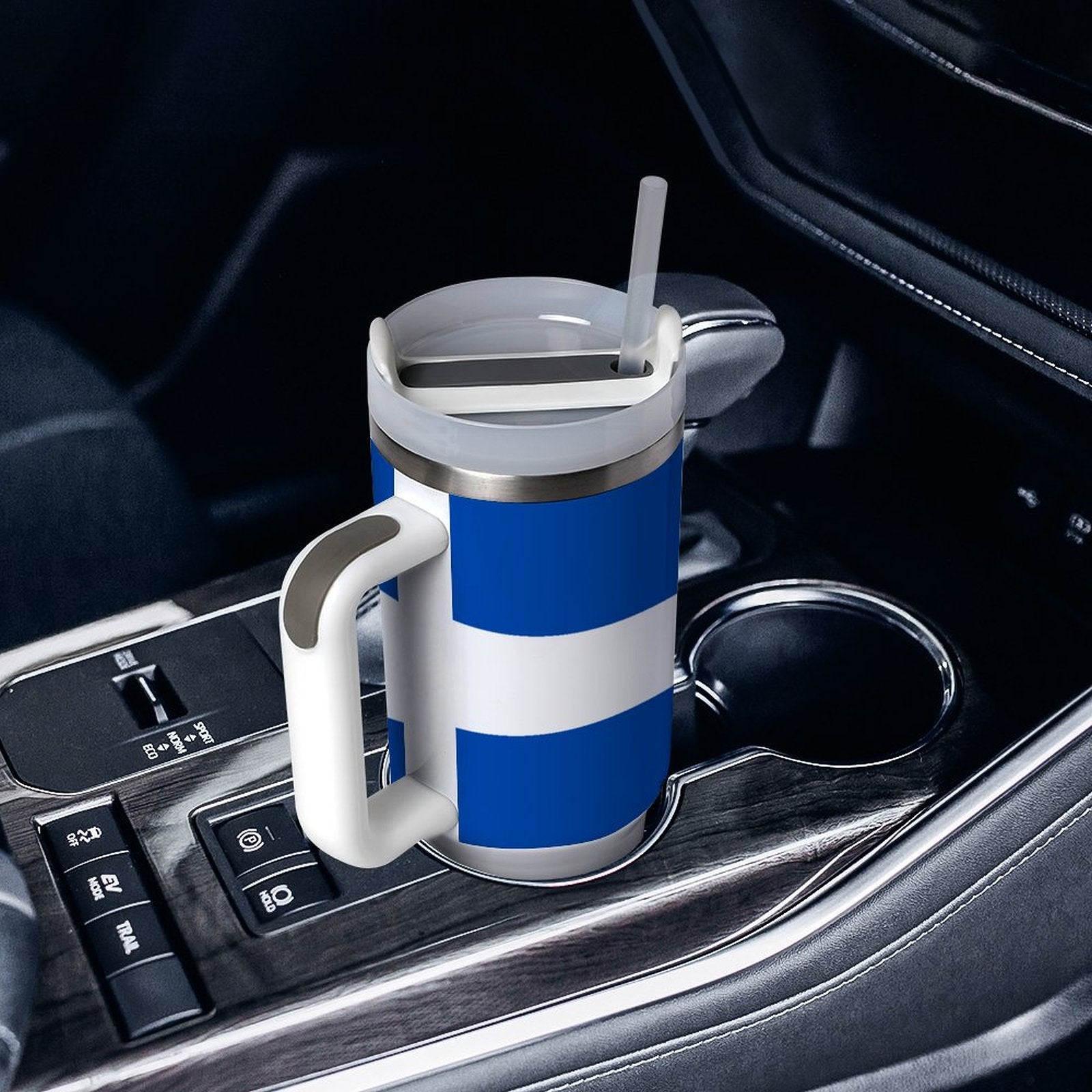 [Brand] insulated mug with straw in car cup holder.