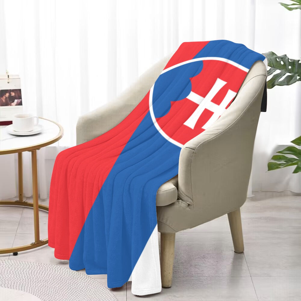 Luv My Flag blanket draped over chair, vibrant colors displayed.