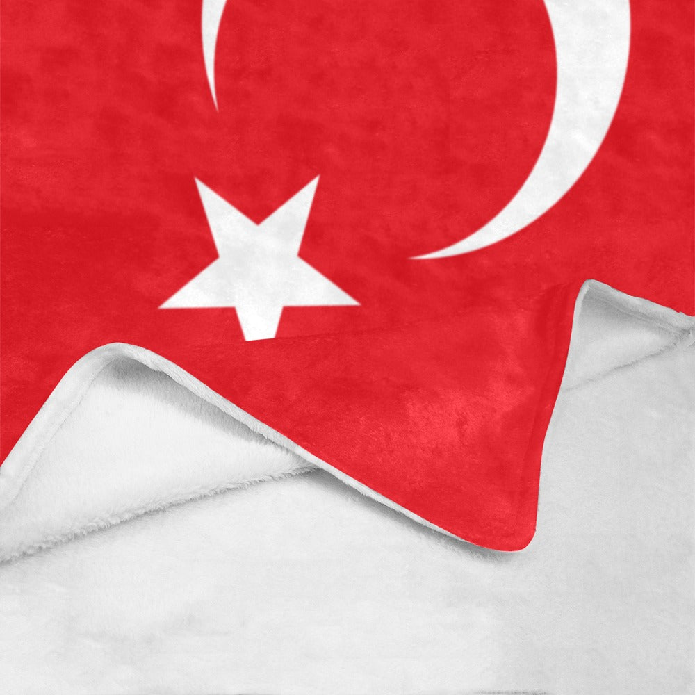 Red blanket with white star, crescent. Brand: Luv My Flag.
