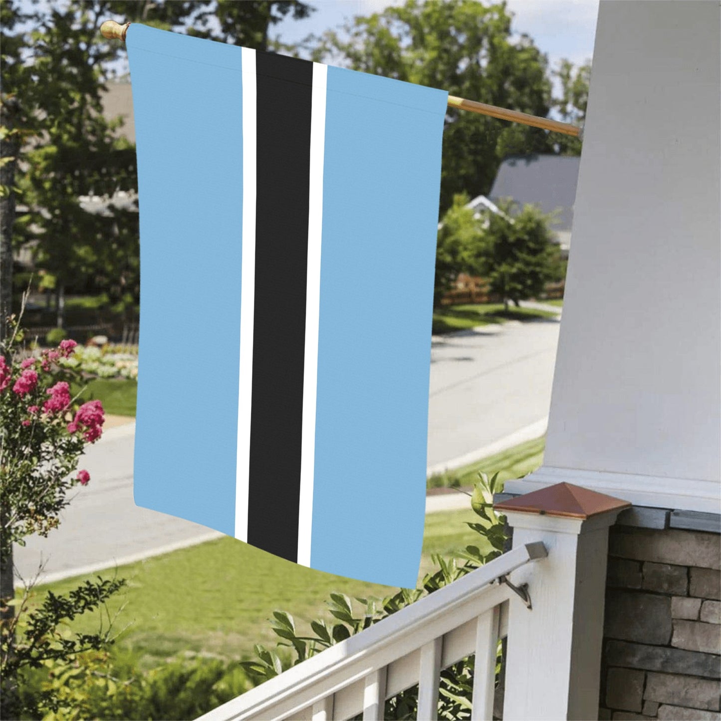 [Luv My Flag] outdoor Botswana flag on suburban porch.