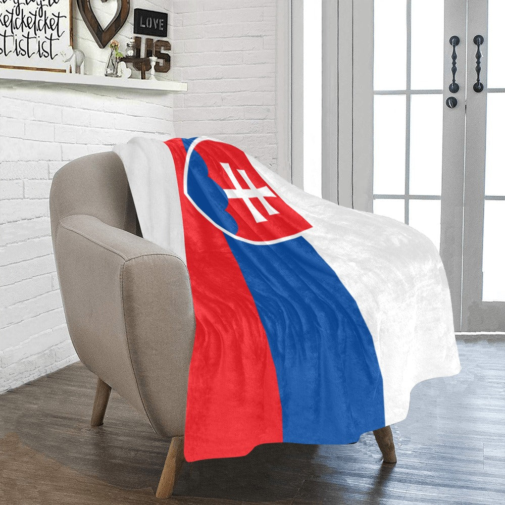 Cozy chair with Luv My Flag Slovakia flag blanket.