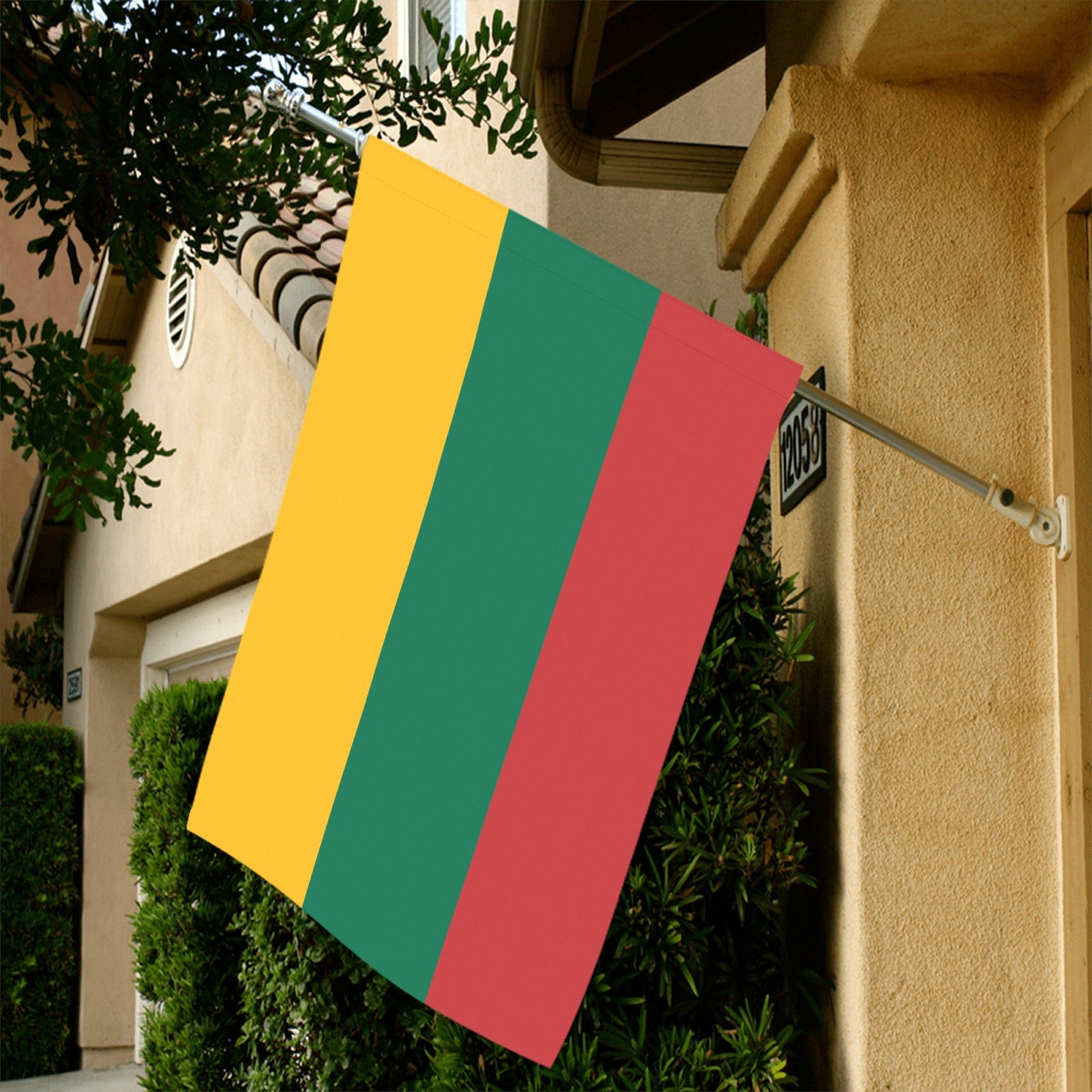Flag with yellow, green, red stripes outside house. Luv My Flag.