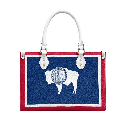 [Brand] handbag with buffalo emblem, red, white, and blue.