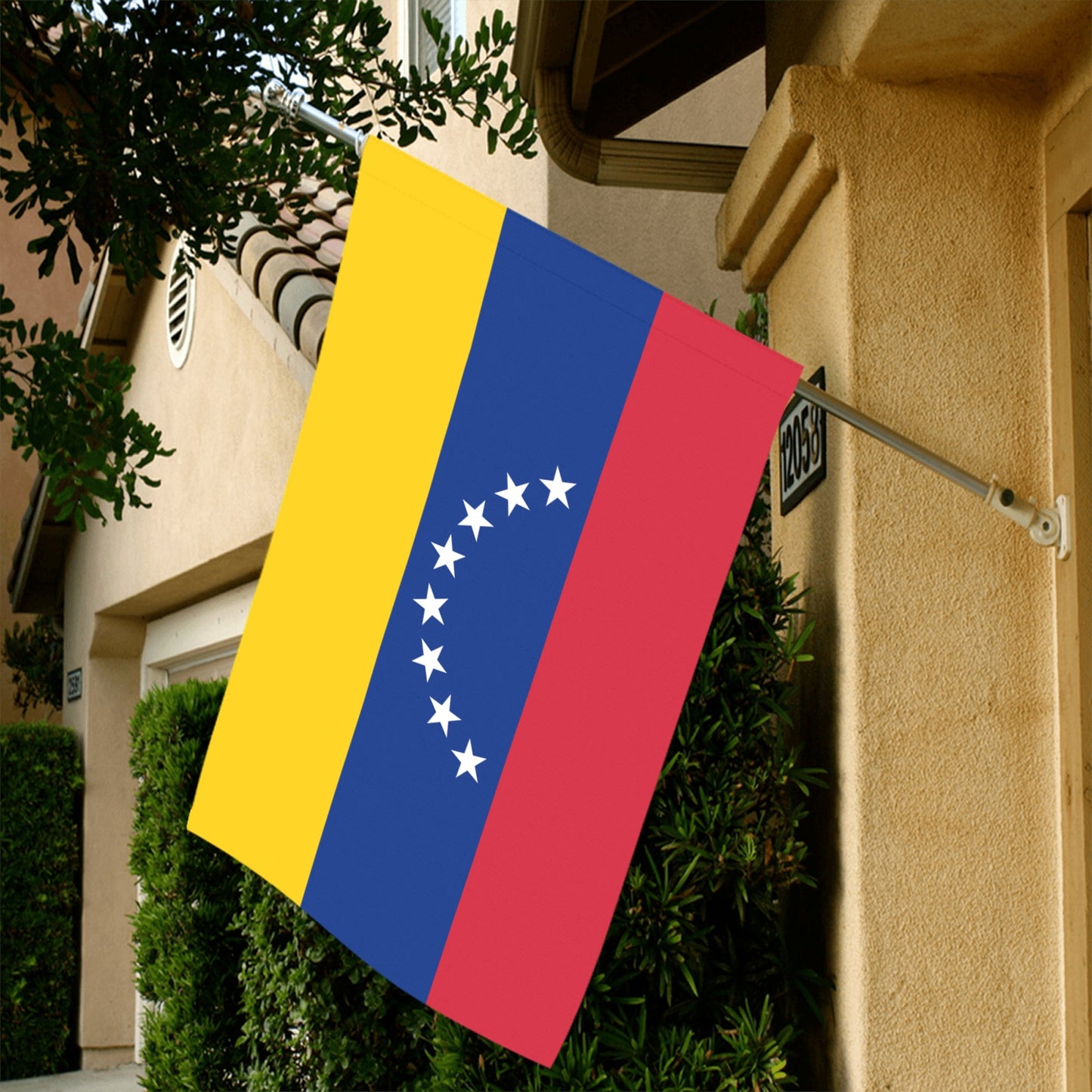 Venezuelan flag hanging outside house, brand: Luv My Flag.