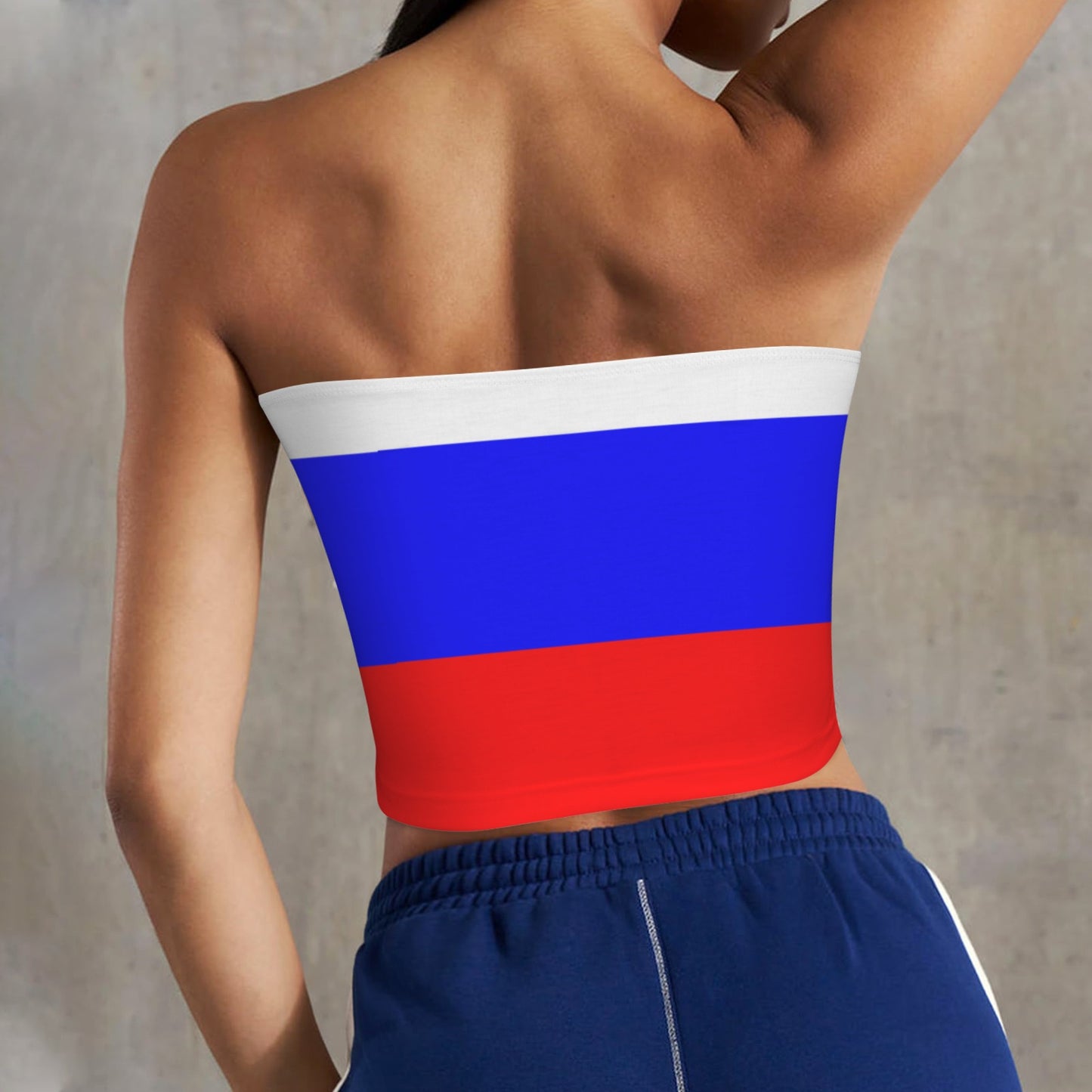 Back view: person wearing [Brand] top with Russian flag.