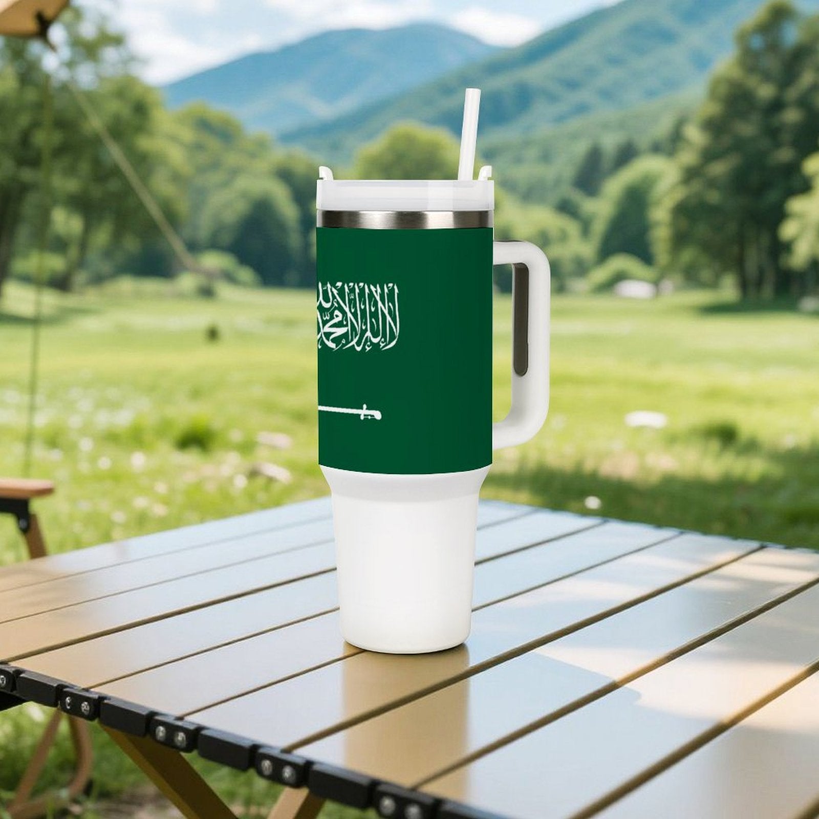 Outdoor setting featuring [Brand] green tumbler with Arabic script design.
