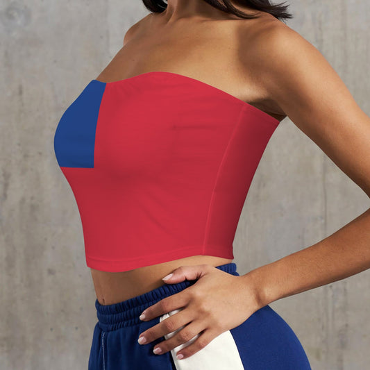 "Model wearing [Brand] red strapless top and blue pants."