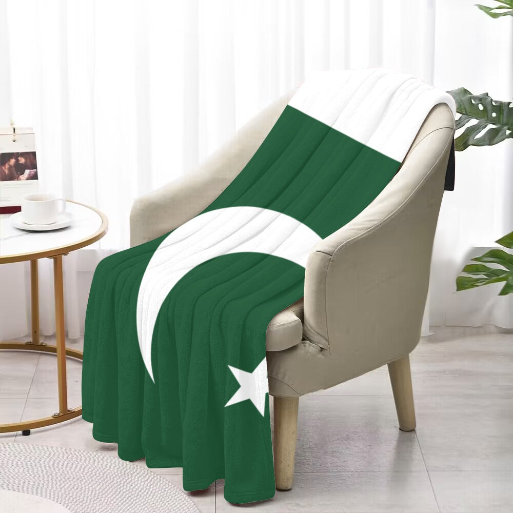Luv My Flag blanket on chair with crescent design.