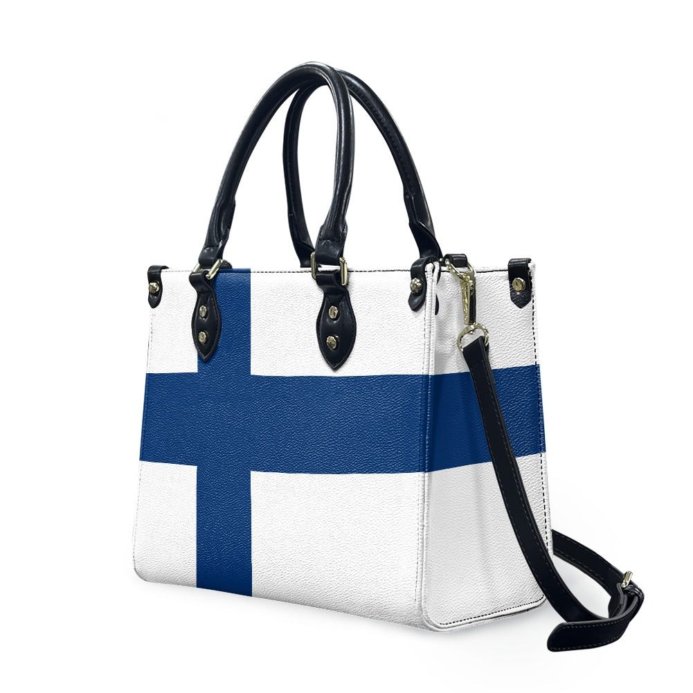 [Brand] handbag featuring Finnish flag design with black straps.