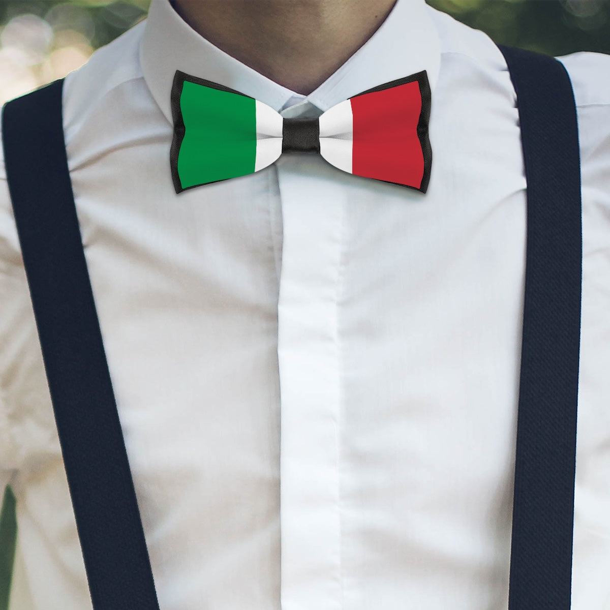 Person wearing Italian flag bowtie with black suspenders. [Brand]