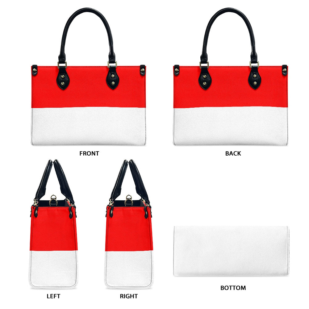 [Brand] handbag with red, white body and black handles.