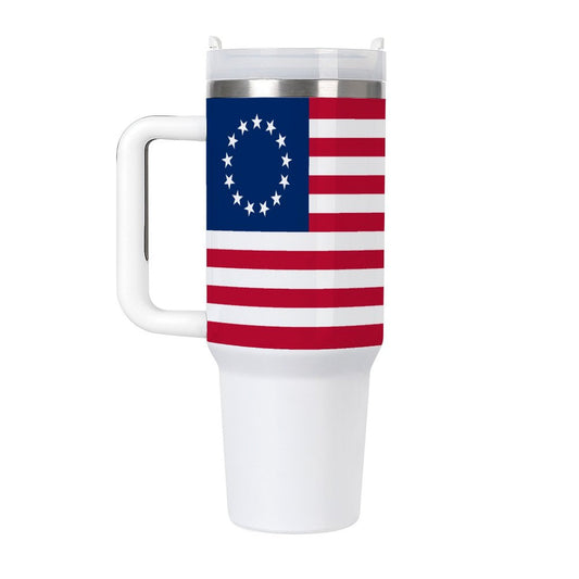 [Brand] travel mug with American flag design, white handle.