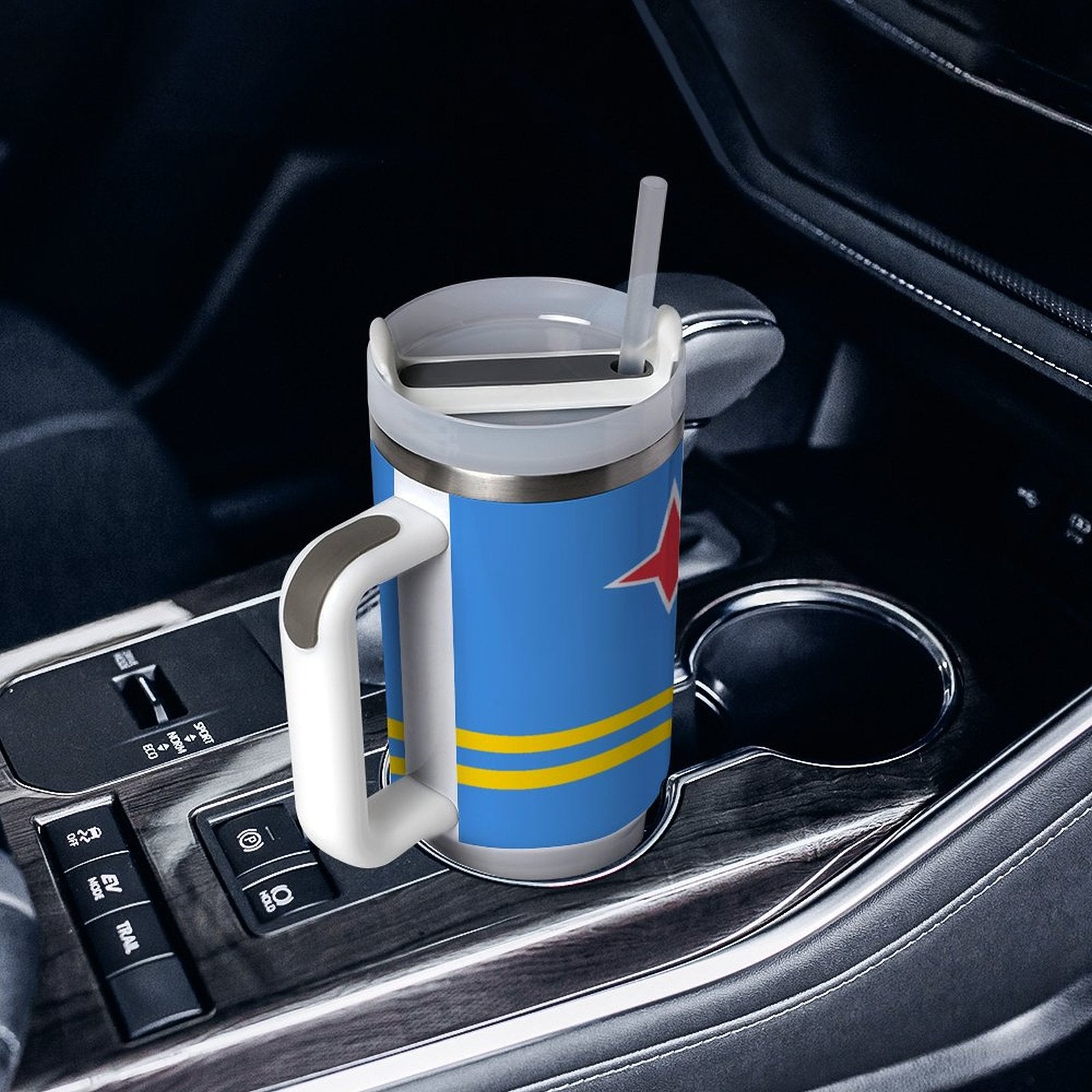 [Brand] blue travel mug with handle in car cup holder.