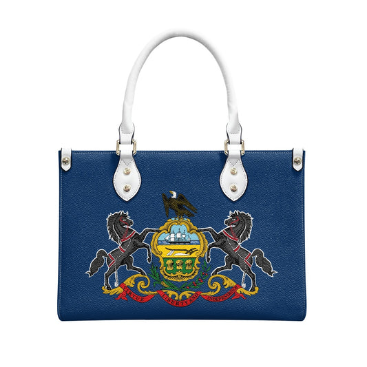 Blue [Brand] handbag with Pennsylvania coat of arms design.