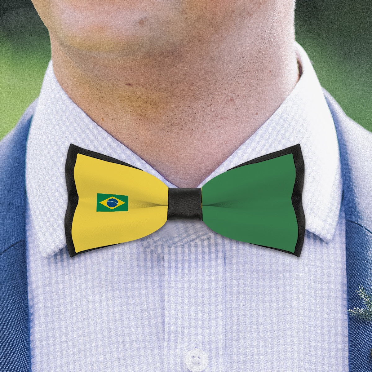 Man wearing bow tie with Brazil flag by [Brand].