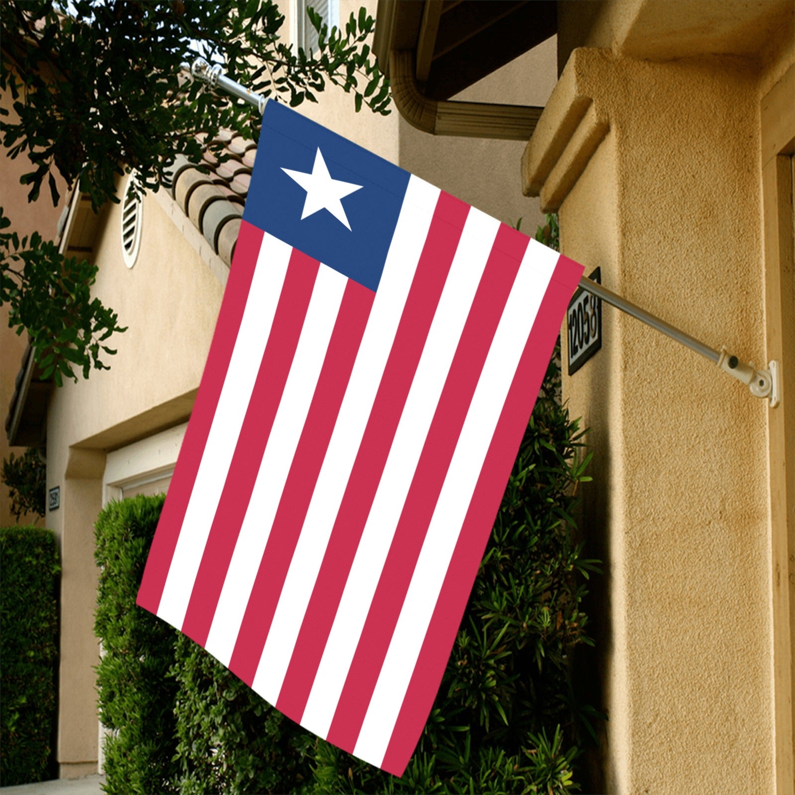 [Luv My Flag] patriotic flag displayed outside suburban house.