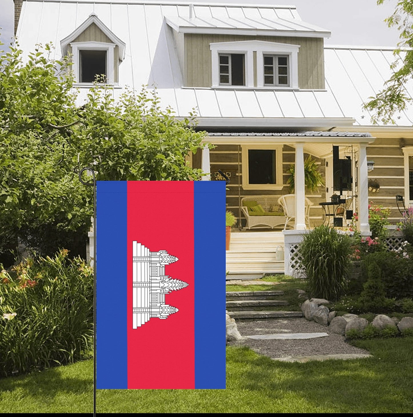 Luv My Flag Cambodian flag displayed outside rustic home.