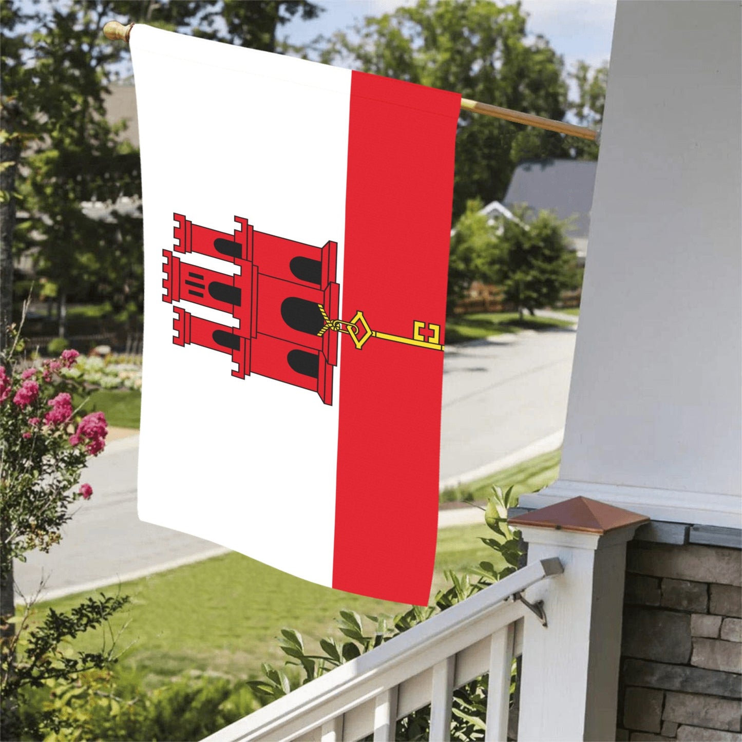 Luv My Flag: Gibraltar flag hanging outside suburban home.