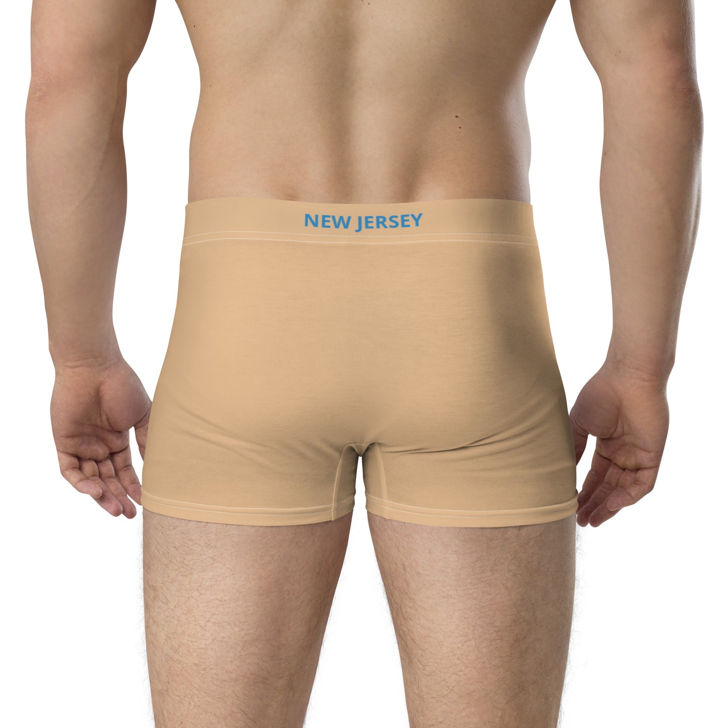 Back view of person wearing [Brand] beige boxer briefs.

