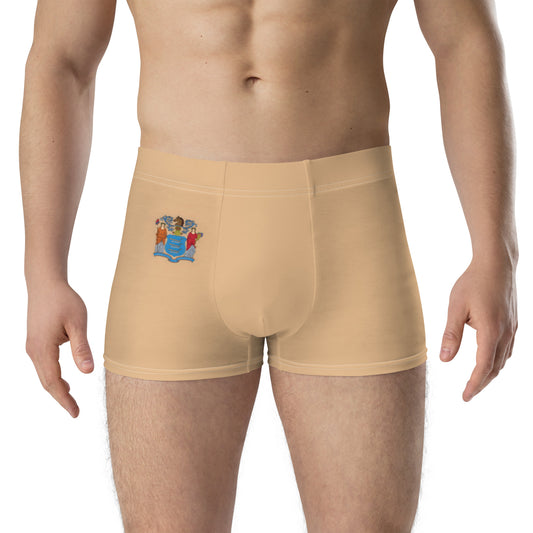 Beige boxer briefs featuring a small crest design, [Brand].