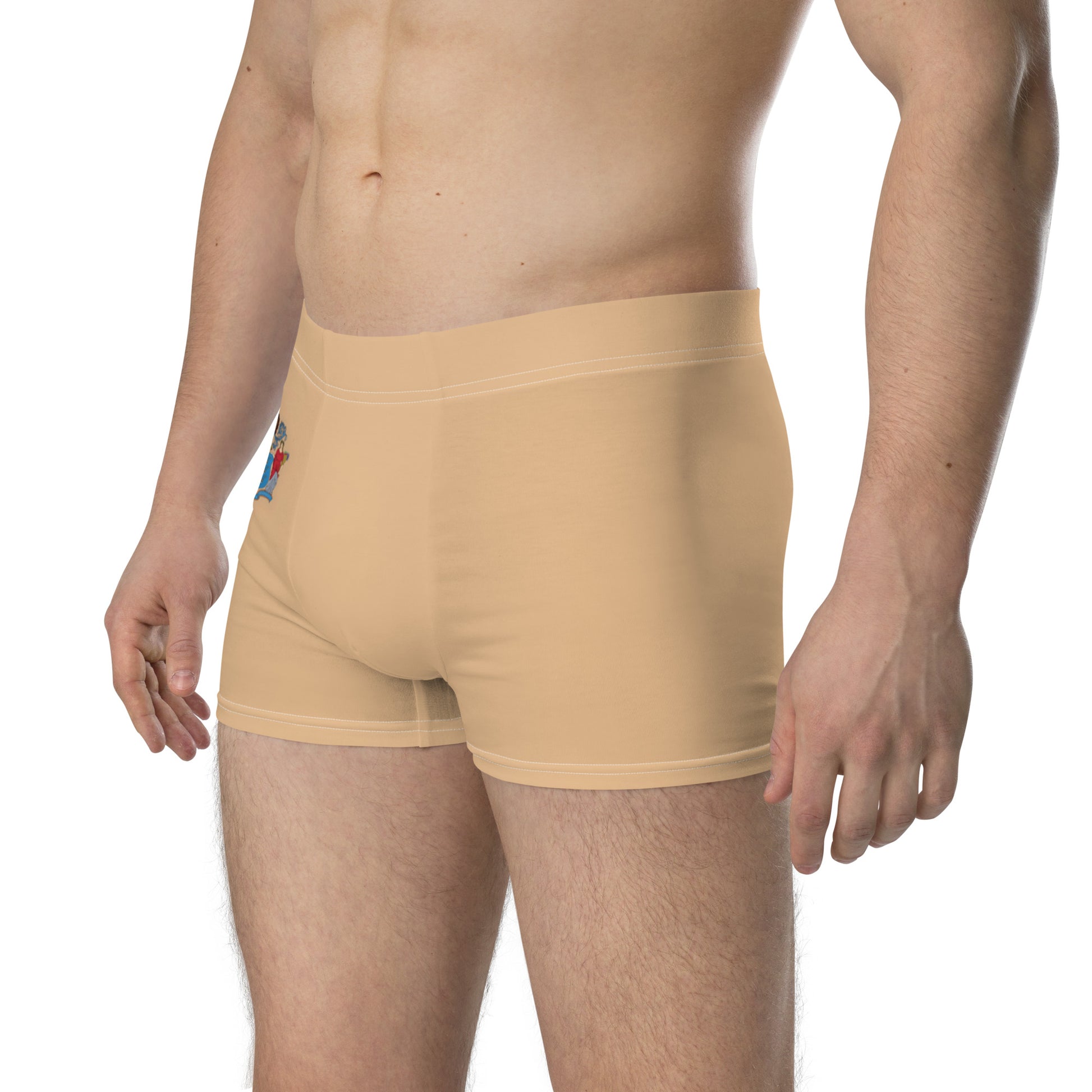 Shirtless man wearing beige [Brand] boxer briefs, side view.