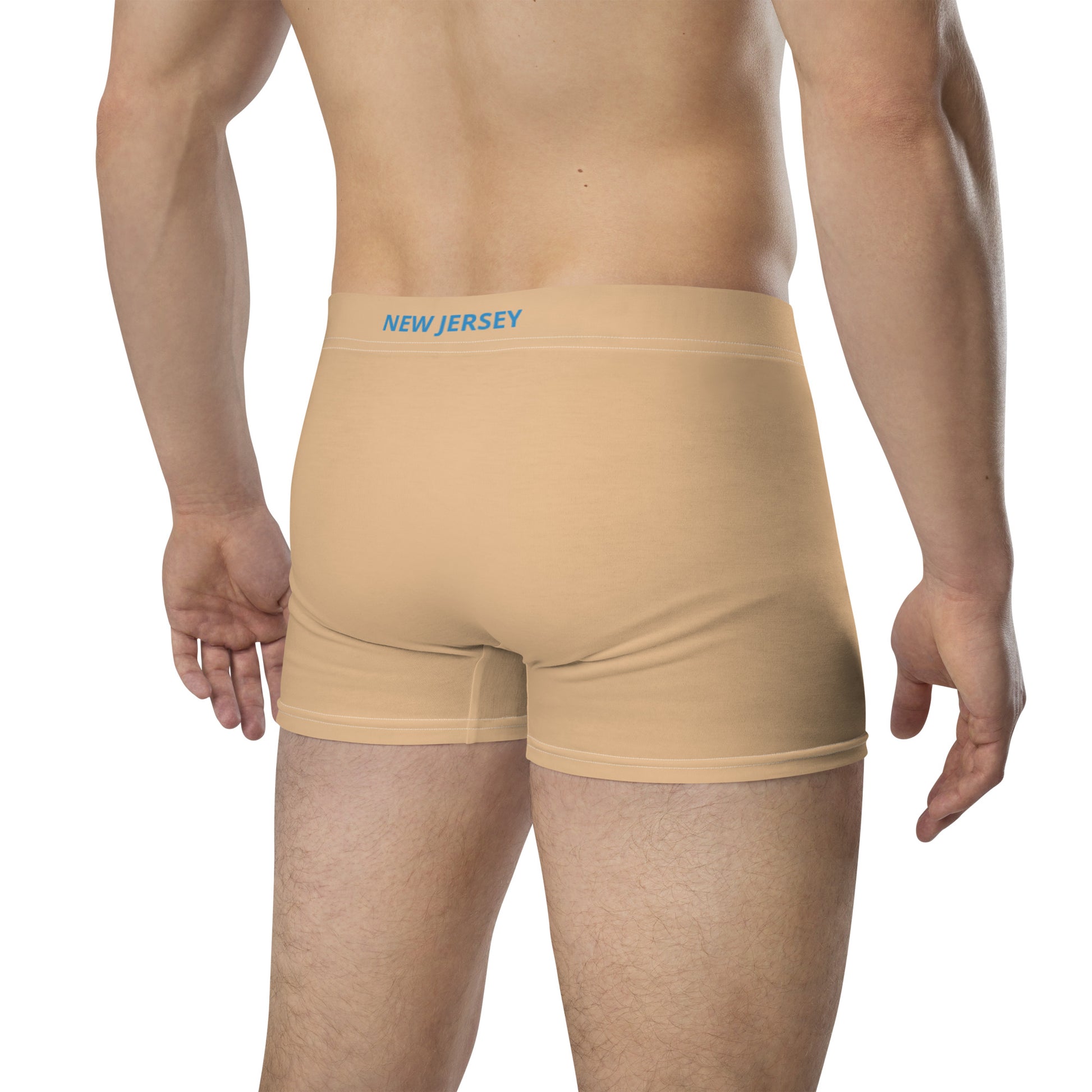 Man wearing beige [Brand] underwear with "New Jersey" waistband.