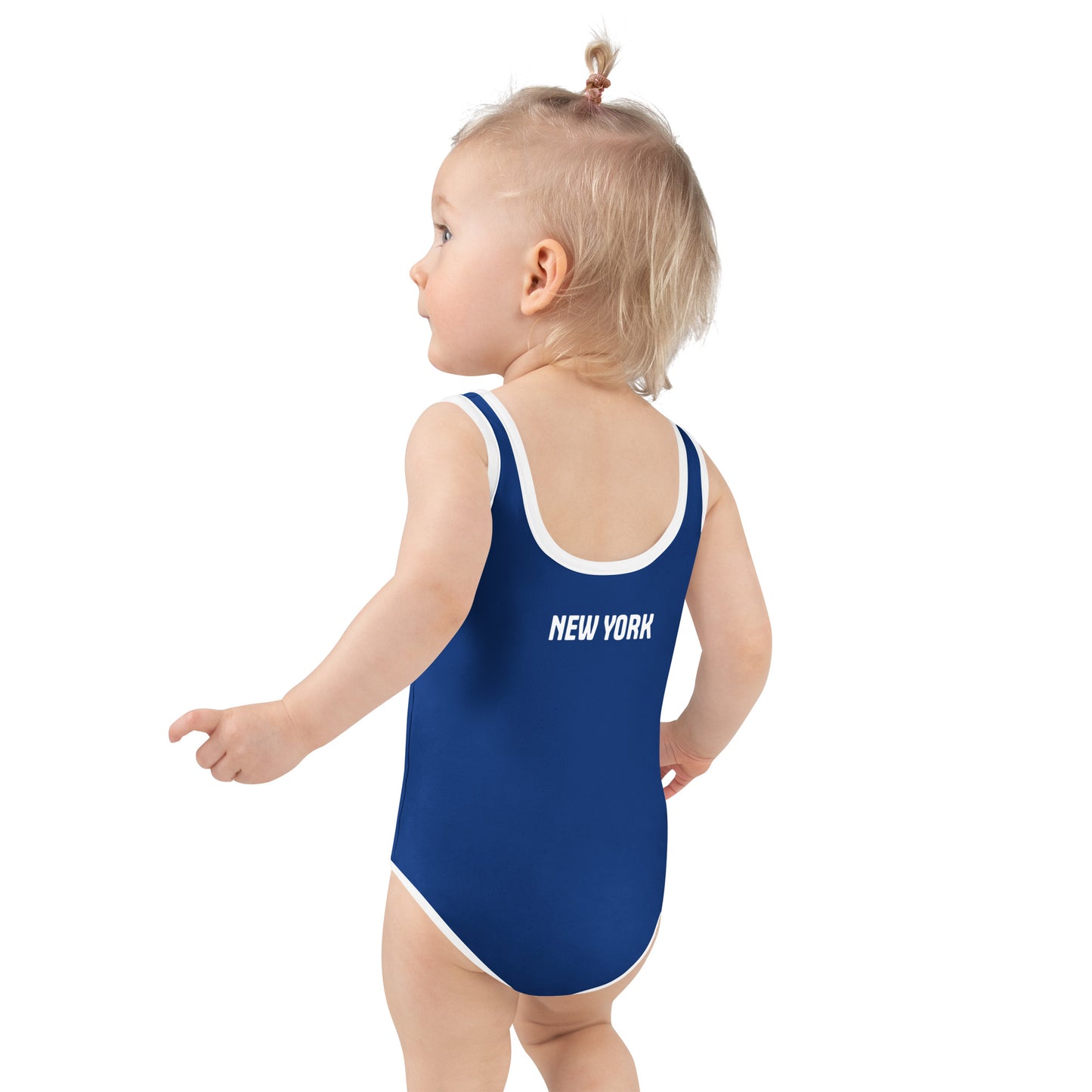 Toddler wearing [Brand] blue swimsuit with "New York" text.
