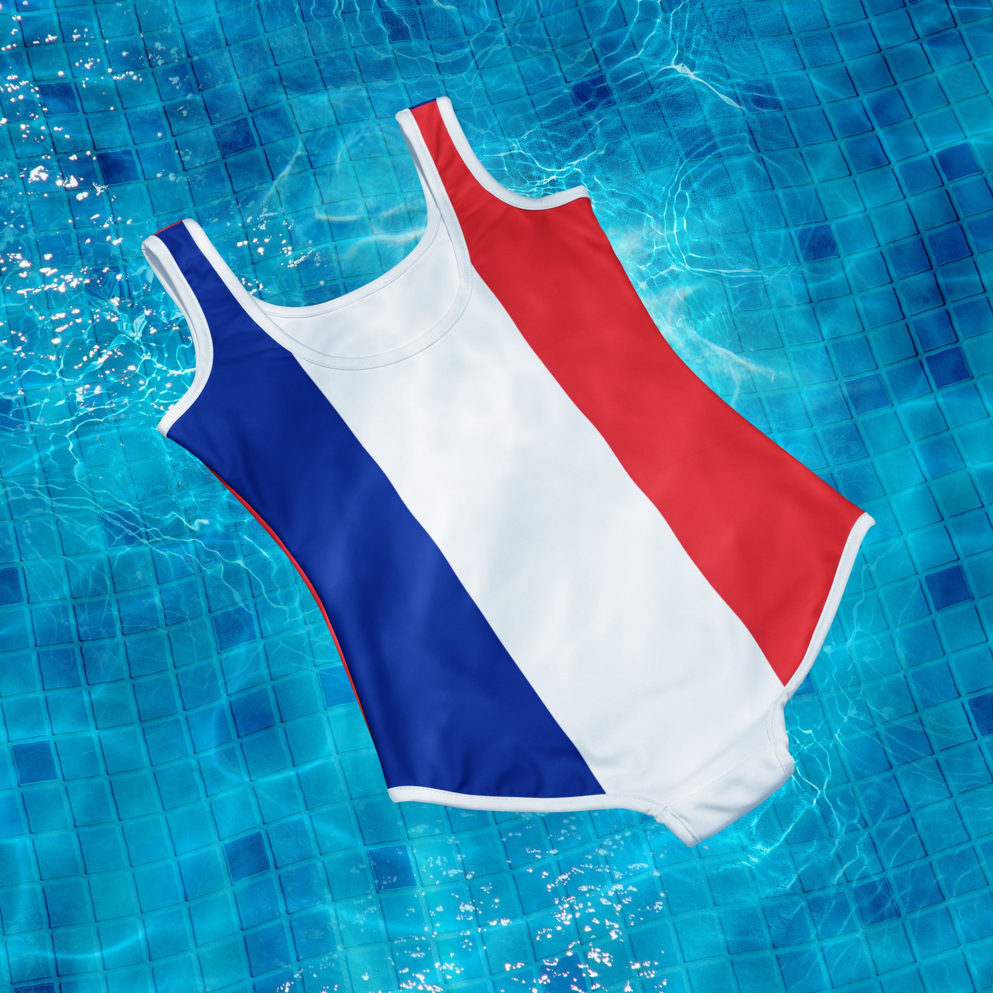 [Brand] swimsuit with red, white, blue stripes in pool.