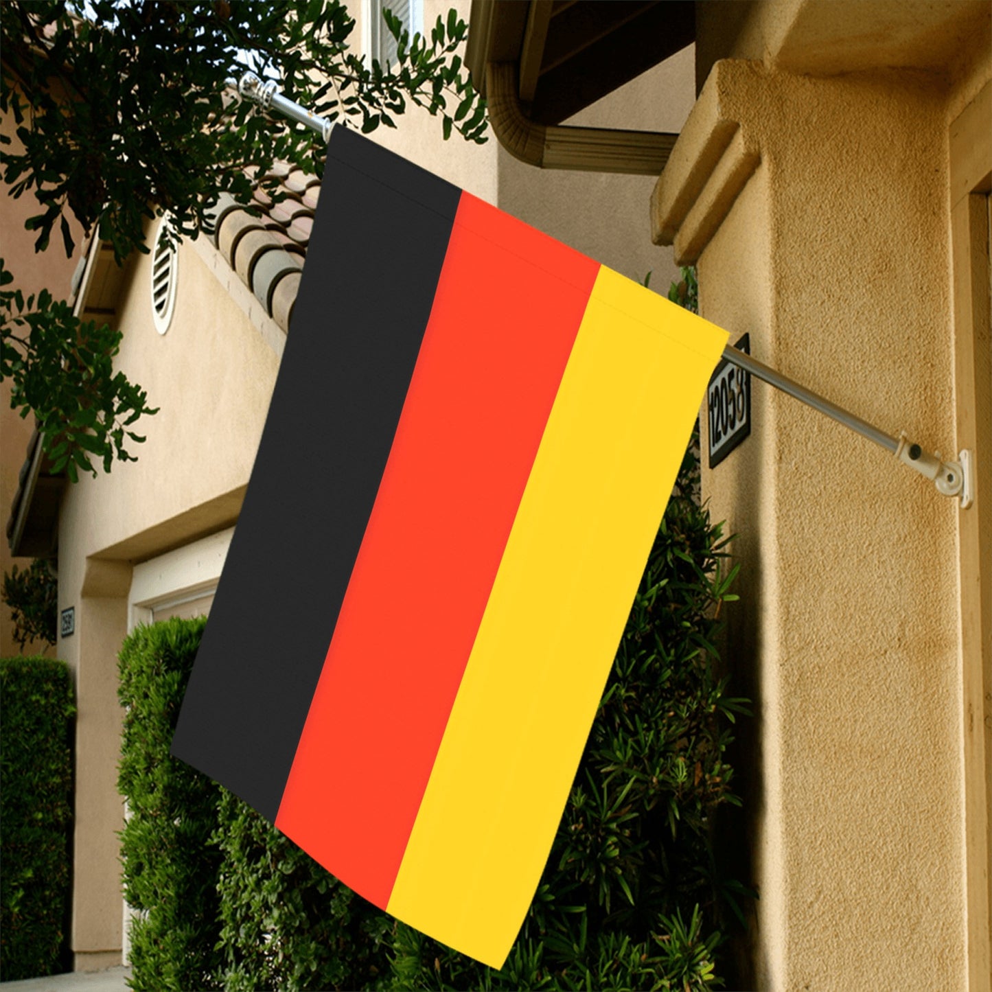 [Luv My Flag]: German flag hanging outside a residential building.