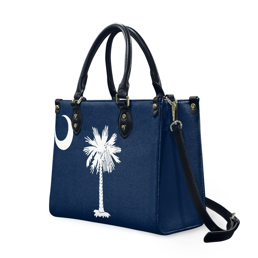 Blue handbag with palm and crescent logo, [Brand] design.