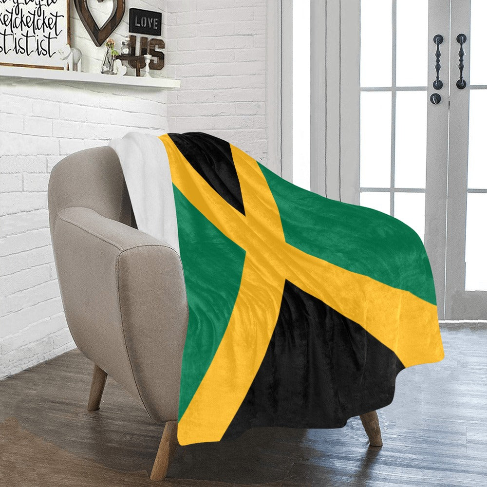 Jamaican flag blanket by Luv My Flag on chair.
