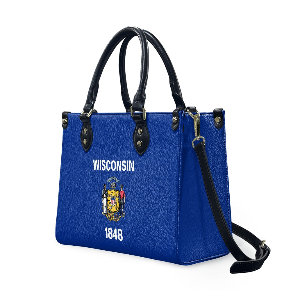 Blue handbag featuring Wisconsin emblem and [Brand] logo, 1848 design.