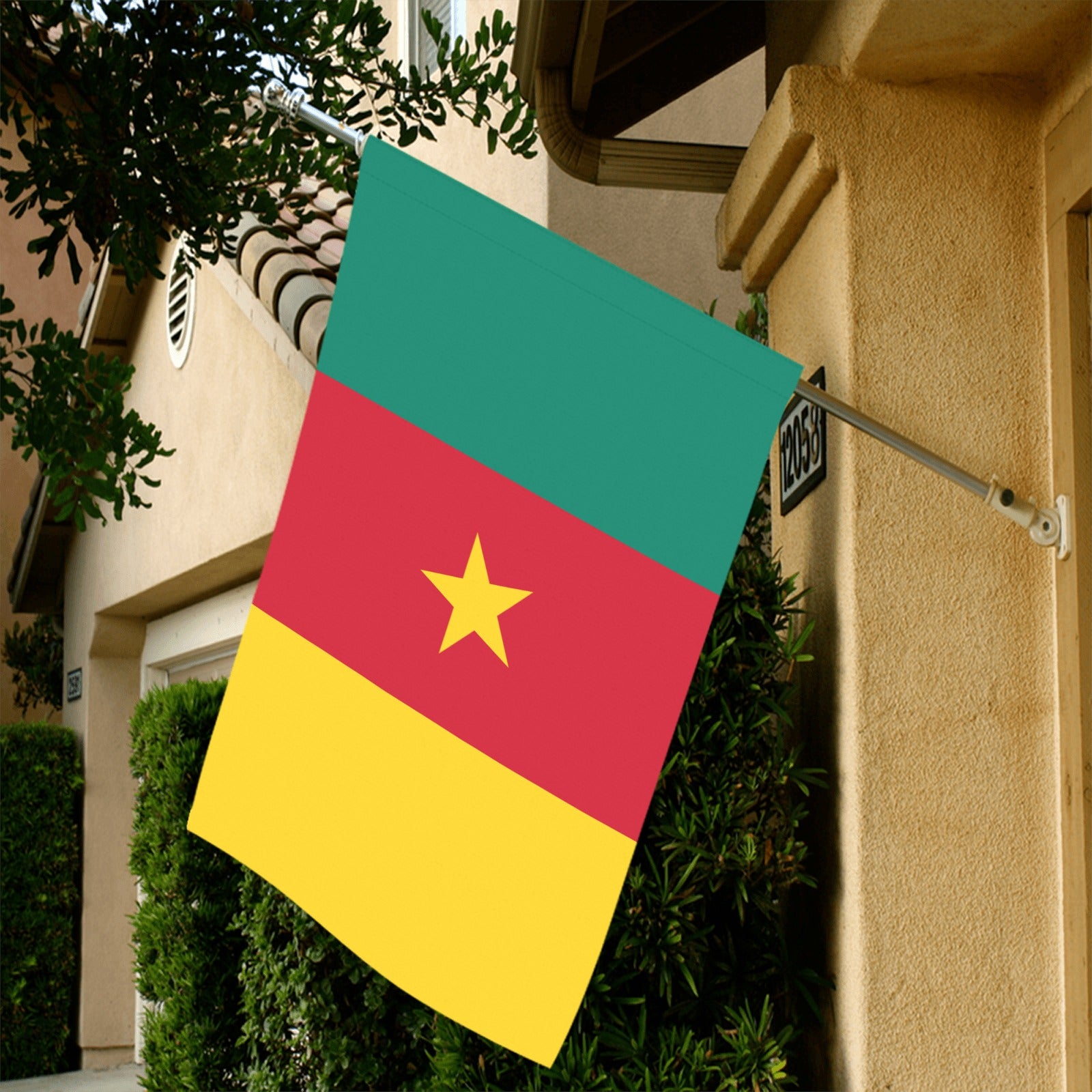 Luv My Flag: Cameroon flag displayed outside a house.