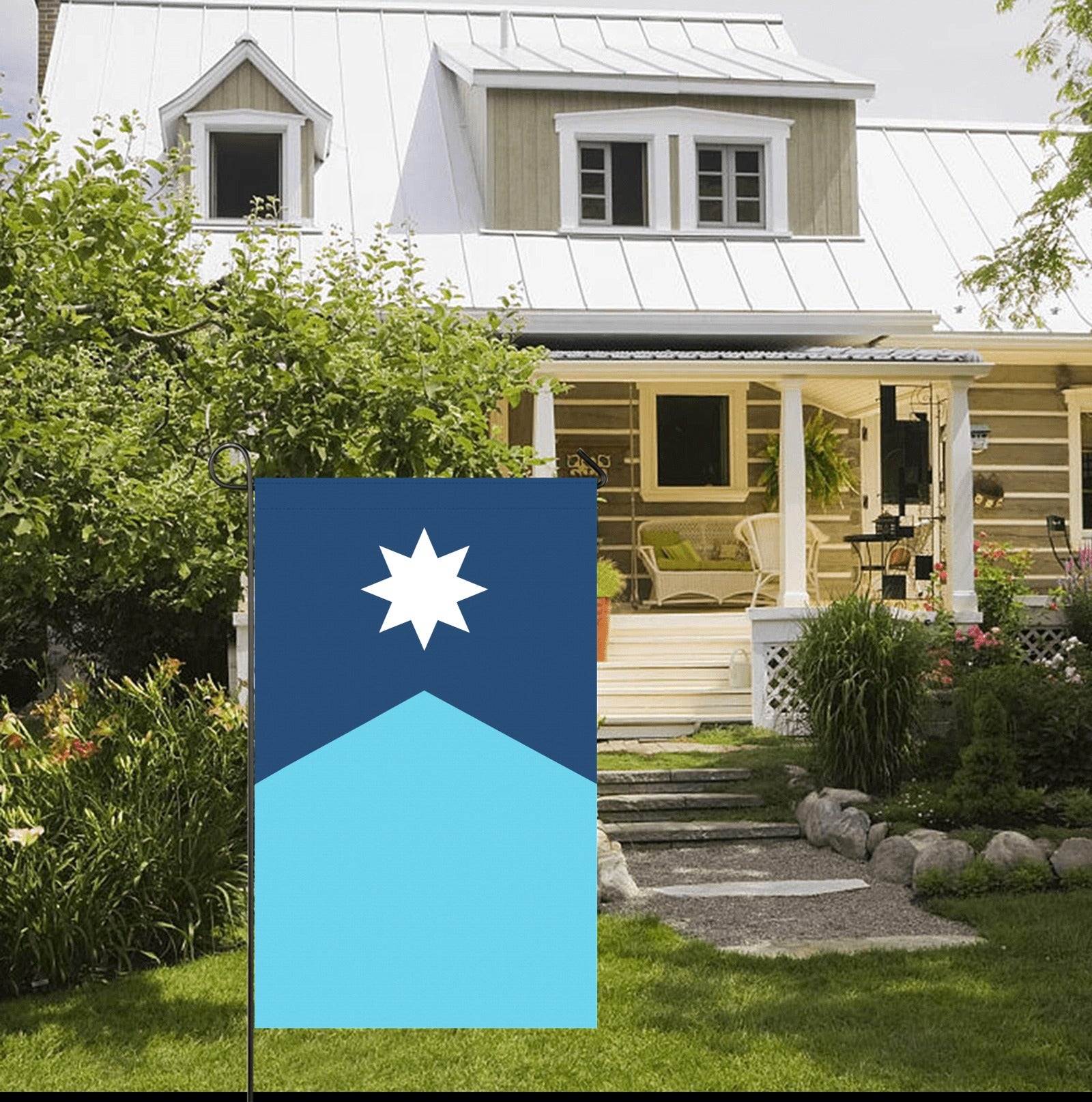 Flag display by porch, blue house, Luv My Flag brand.