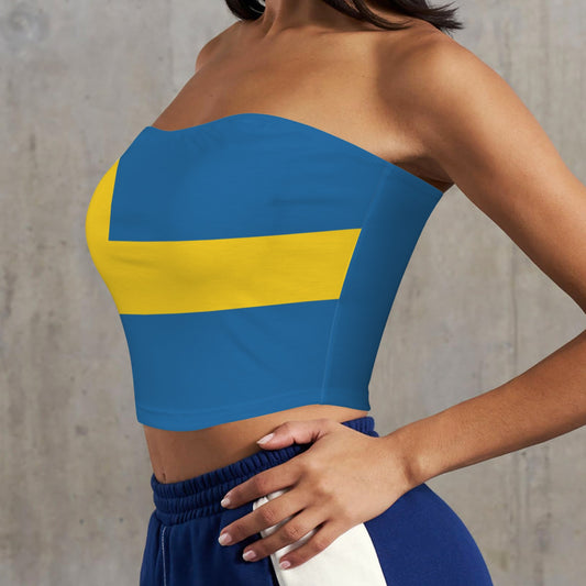 Woman wearing [Brand] blue crop top with yellow stripes.