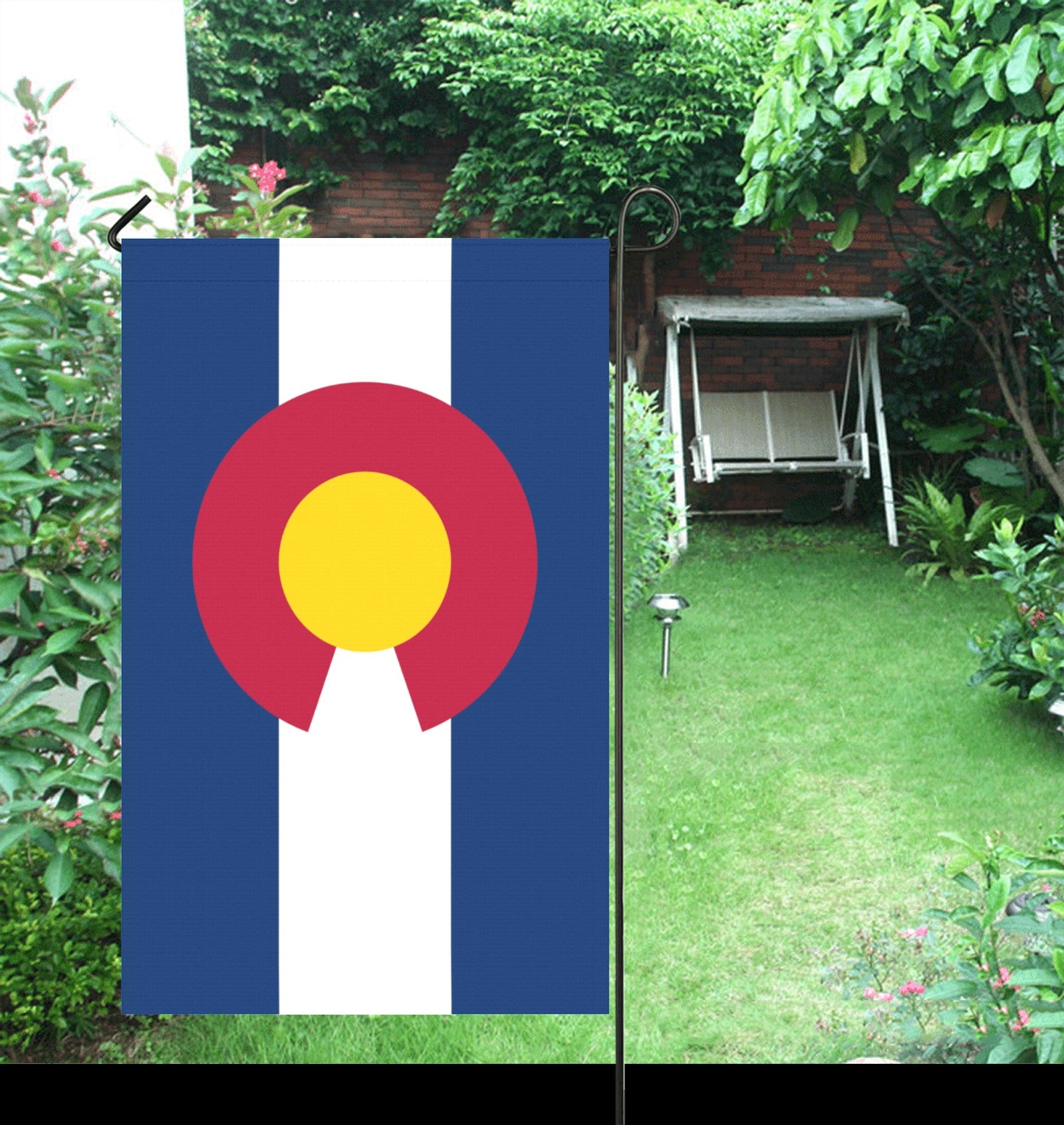 "Luv My Flag garden banner featuring Colorado design in yard."
