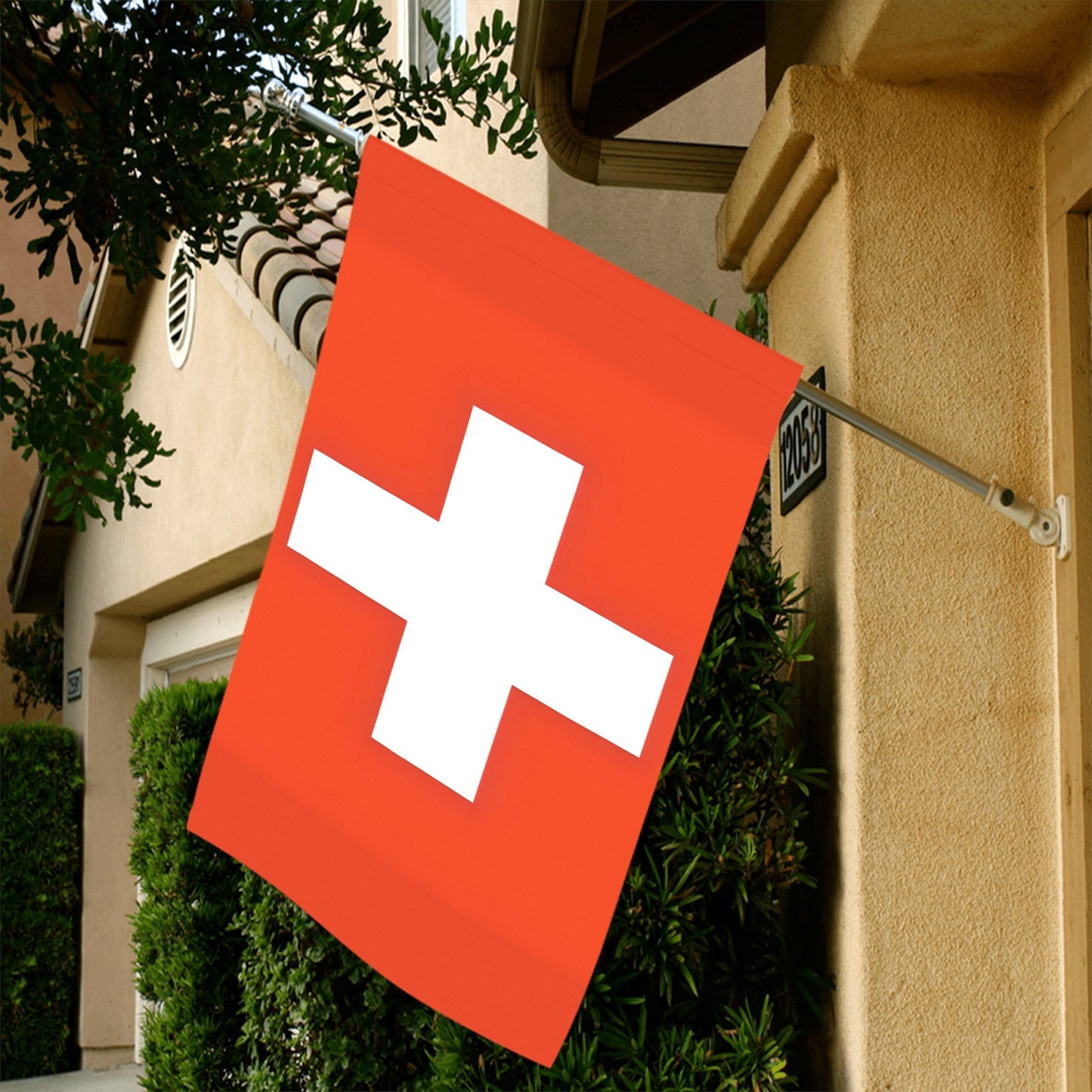 Red Swiss flag by Luv My Flag on house.