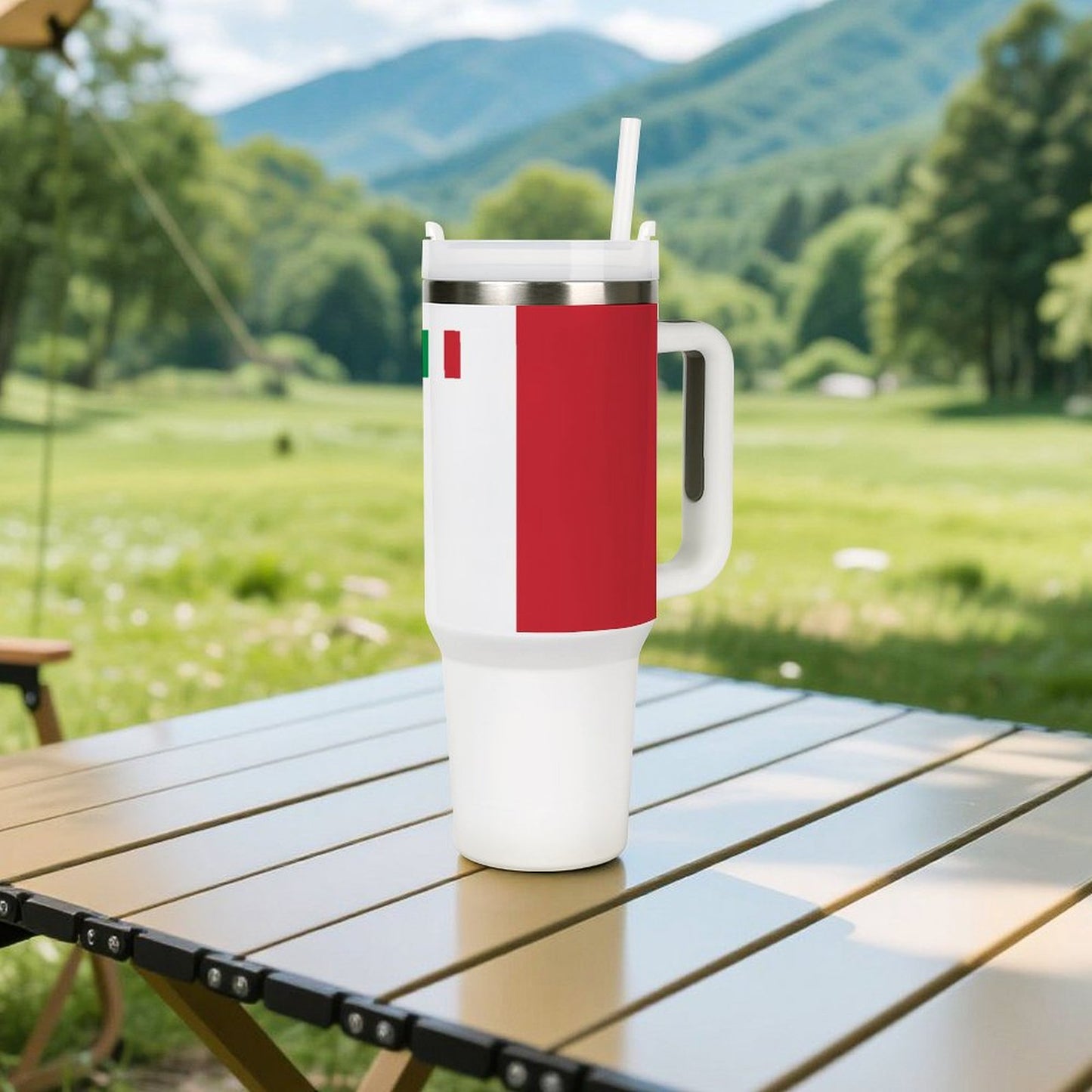 [Brand] insulated mug with handle on outdoor table, scenic background.
