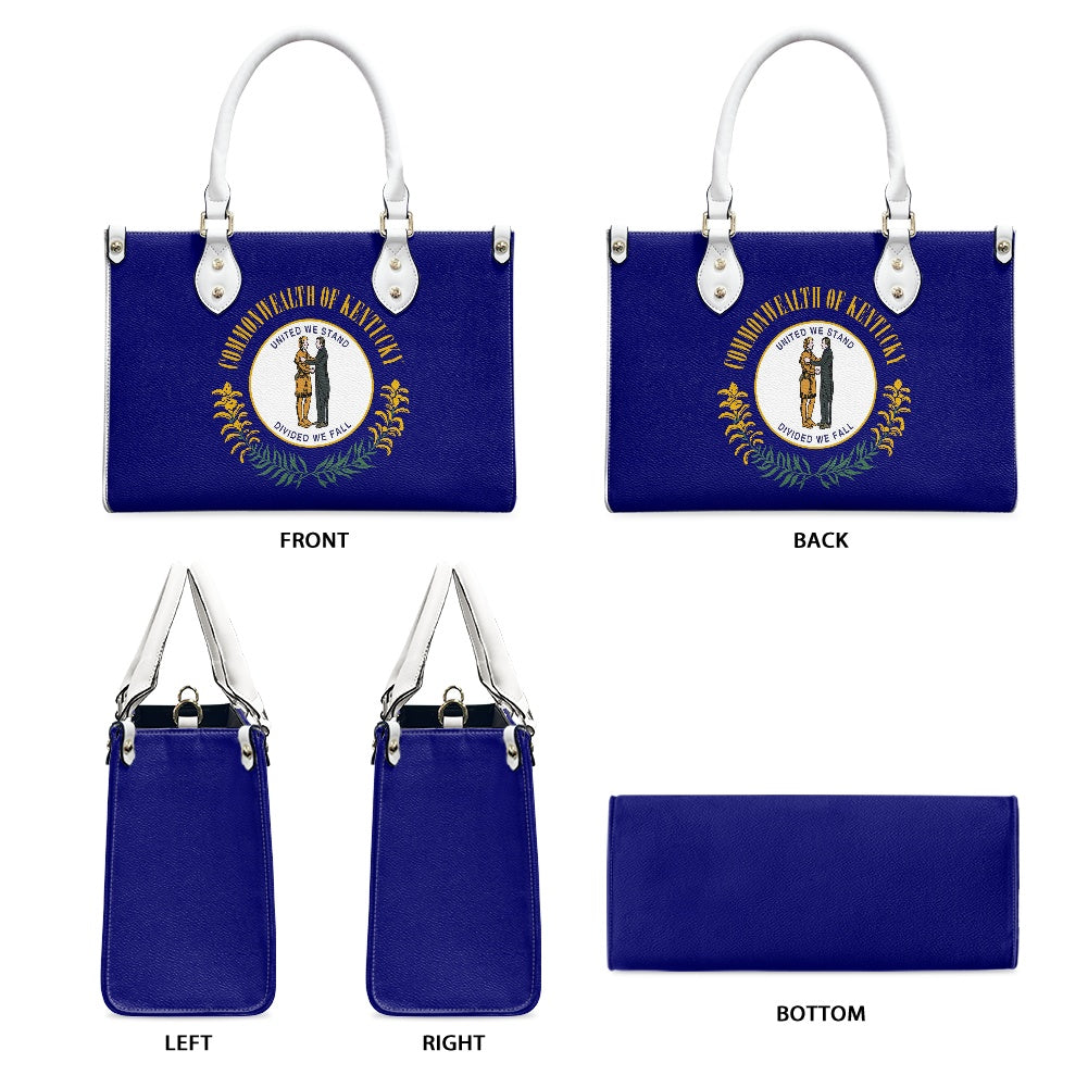 Blue handbag with white handles, featuring [Brand] Kentucky emblem.