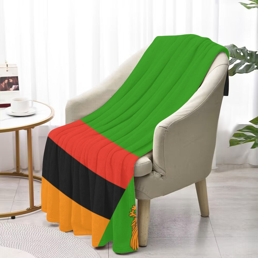 Luv My Flag blanket with green, red, black, orange stripes.